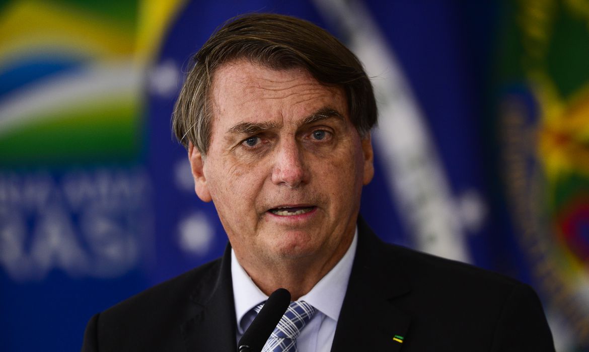 O presidente Jair Bolsonaro durante cerimônia para sanção dos projetos de lei que ampliam a aquisição de vacinas pelo governo federal. (Marcelo Camargo/Agência Brasil)