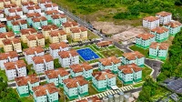 Moradores reclamam de alagamentos em residencial entregue por Lula